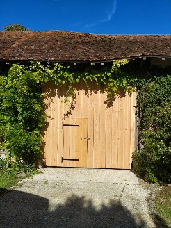 Porte de grange en pin douglas