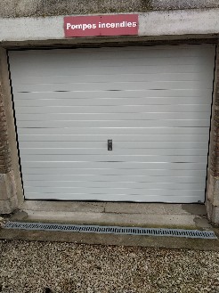 Pose d'une porte de garage sectionnelle