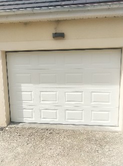 Pose d'une porte de garage sectionnelle