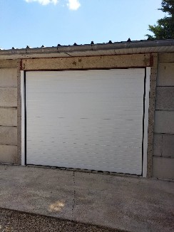 Pose d'une porte de garage sectionnelle