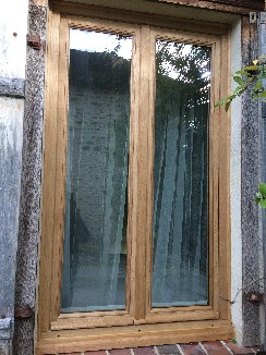 Pose de fenêtre en chêne massif avec vitrage phonique